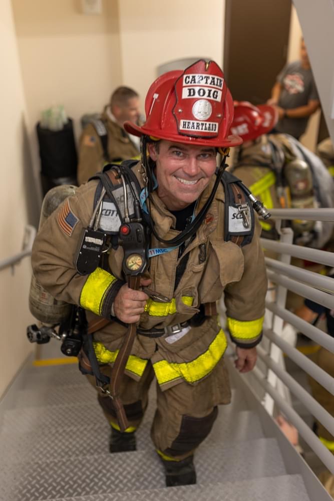 Captain Doig leads the Heartland Fire & Rescue 911 Memorial Stair Climb team.