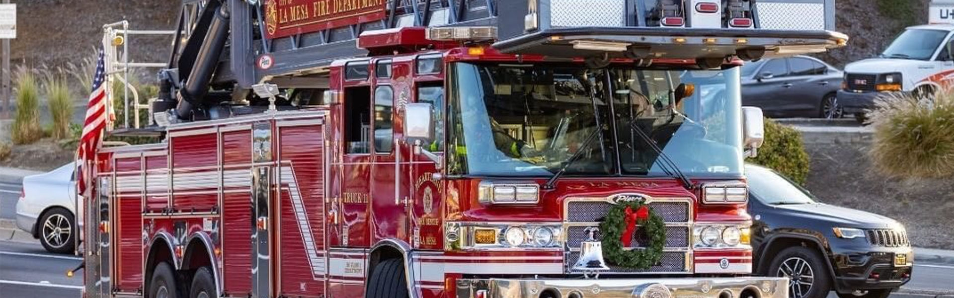 la mesa fire department fire engine driving down busy road